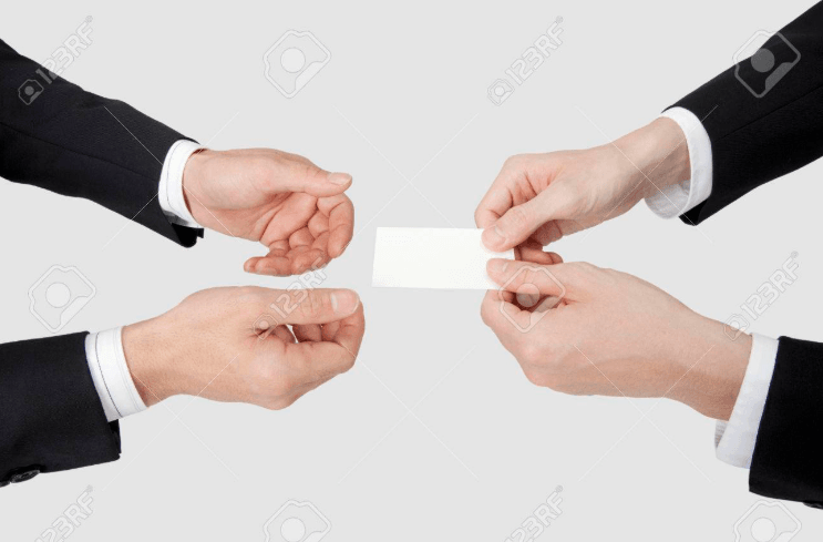 A professional Korean business etiquette scene showing a formal handshake and exchanging business cards in a Seoul office.